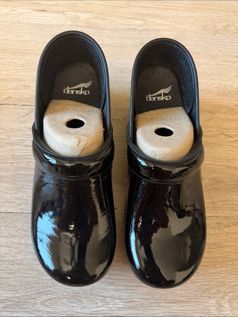 Dansko Black Patent Leather Clogs for Women
